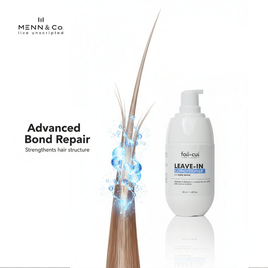 Menn & Co leave-in conditioner bottle with hair strands and blue liquid on a white background