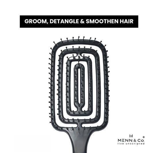 A black rectangular hairbrush with multiple concentric bristle rows and a smooth handle, shown on a white background with the text 'GROOM, DETANGLE & SMOOTHEN HAIR' at the top and the MENN & Co logo at the bottom right.