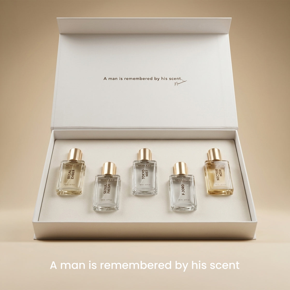 Set of Menn & Co perfume bottles in a box with a quote on a beige background
