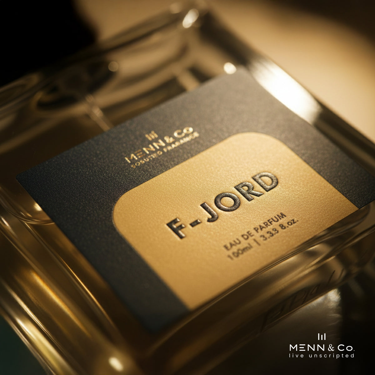 Menn & Co F-Jord Eau de Parfum bottle with gold and black design.