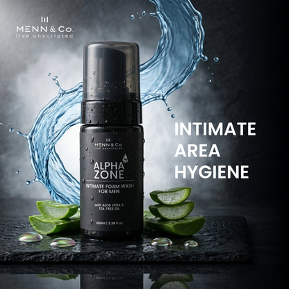 Menn & Co Alpha Zone intimate foam wash bottle with aloe vera slices on a dark background