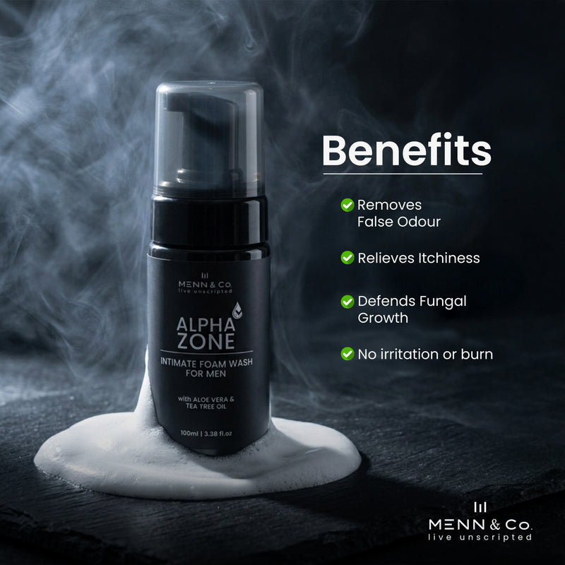 Menn & Co Alpha Zone intimate foam wash bottle with smoke effect and benefits listed on a dark background