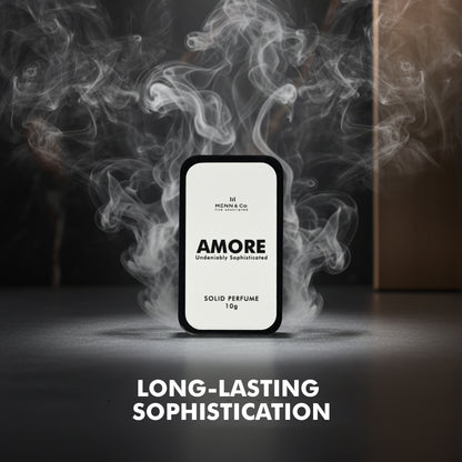 Solid perfume packaging with smoke effect and text 'AMORE' on a dark background