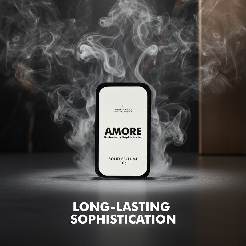 Solid perfume packaging with smoke effect and text 'AMORE' on a dark background