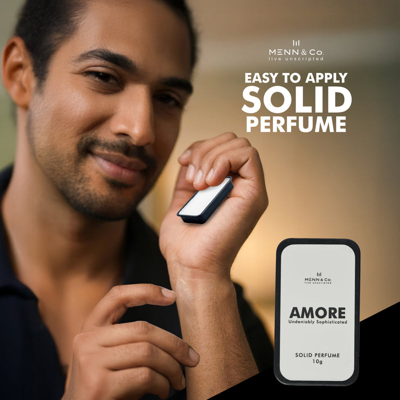 Man applying Amore solid perfume with 'Menn & Co' branding
