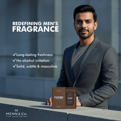 Man in a suit holding a FJORD product with text about men's fragrance features.