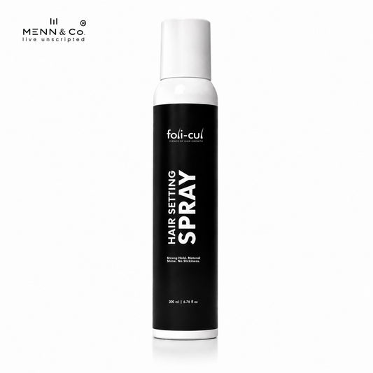 Foli-Cul hair setting spray bottle on a white background