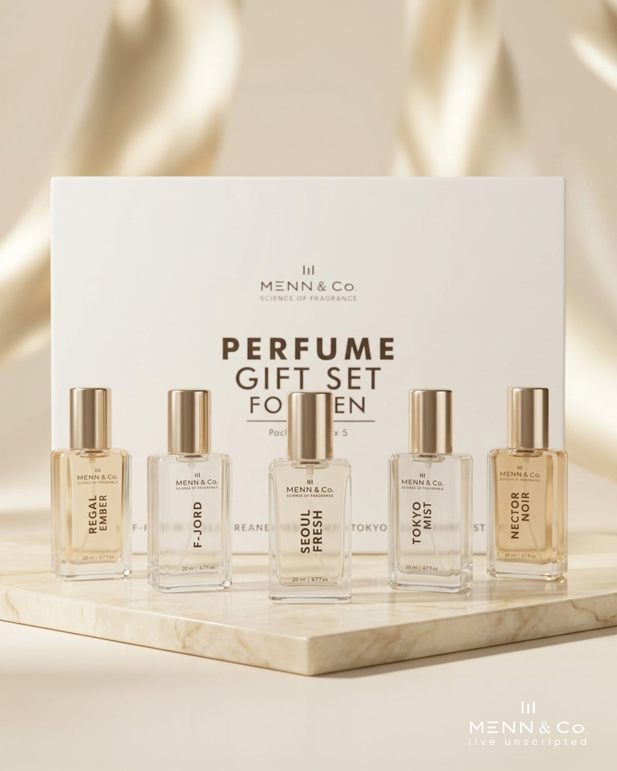 Menn & Co perfume gift set for men with five bottles on a marble surface.