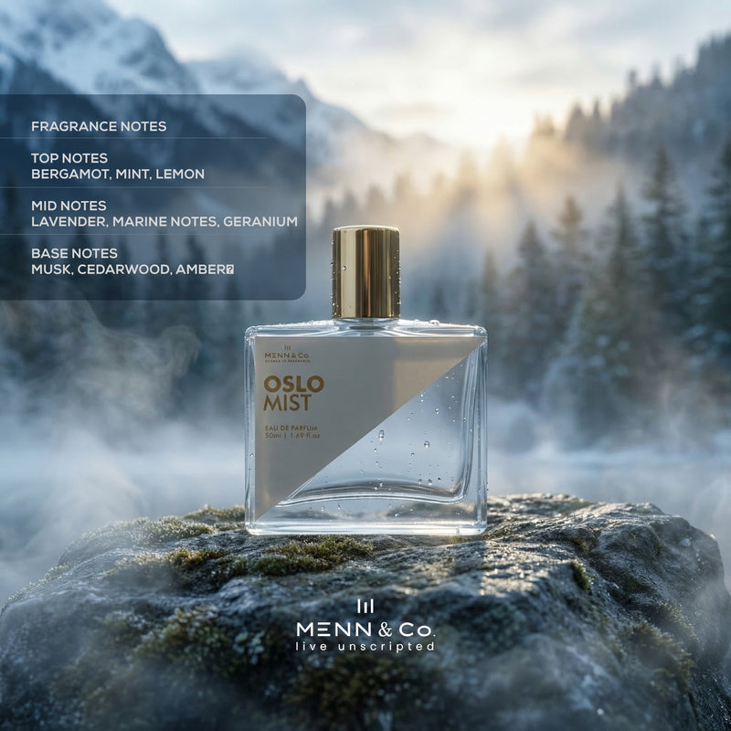 Perfume bottle labeled 'Oslo Mist' by Menn & Co on a rock with a mountainous background