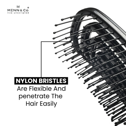 Close-up of a black hairbrush with flexible nylon bristles on a white background, with text reading 'NYLON BRISTLES Are Flexible And penetrate The Hair Easily' and the Menn & Co logo in the top left.