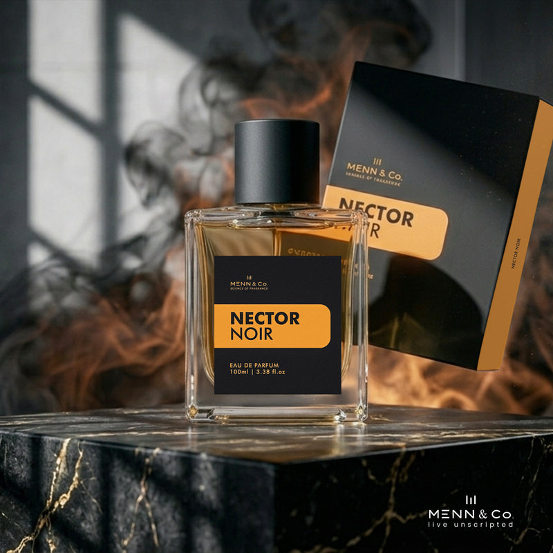 Menn & Co Nector Noir perfume bottle and packaging on a dark surface with a blurred background