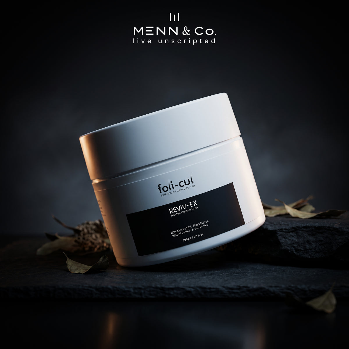 Foli-Cul Reviv-Ex Hair fall Control Mask product with 'MENN & Co.' branding on a dark background