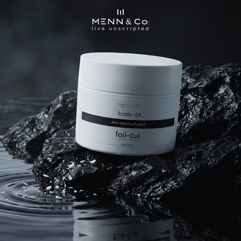Menn & Co. Anti dandruff Mask product on rocks with water