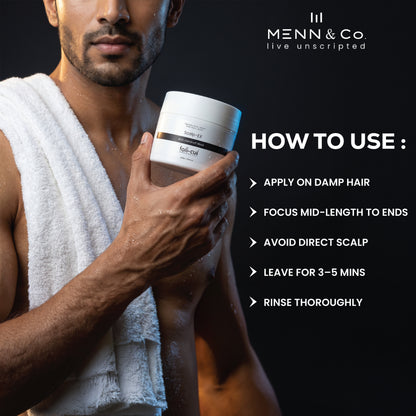 Man holding a hair care product Menn & Co Scalp-Ex Antidandruff Mask with usage instructions on a black background, featuring the Menn & Co brand.