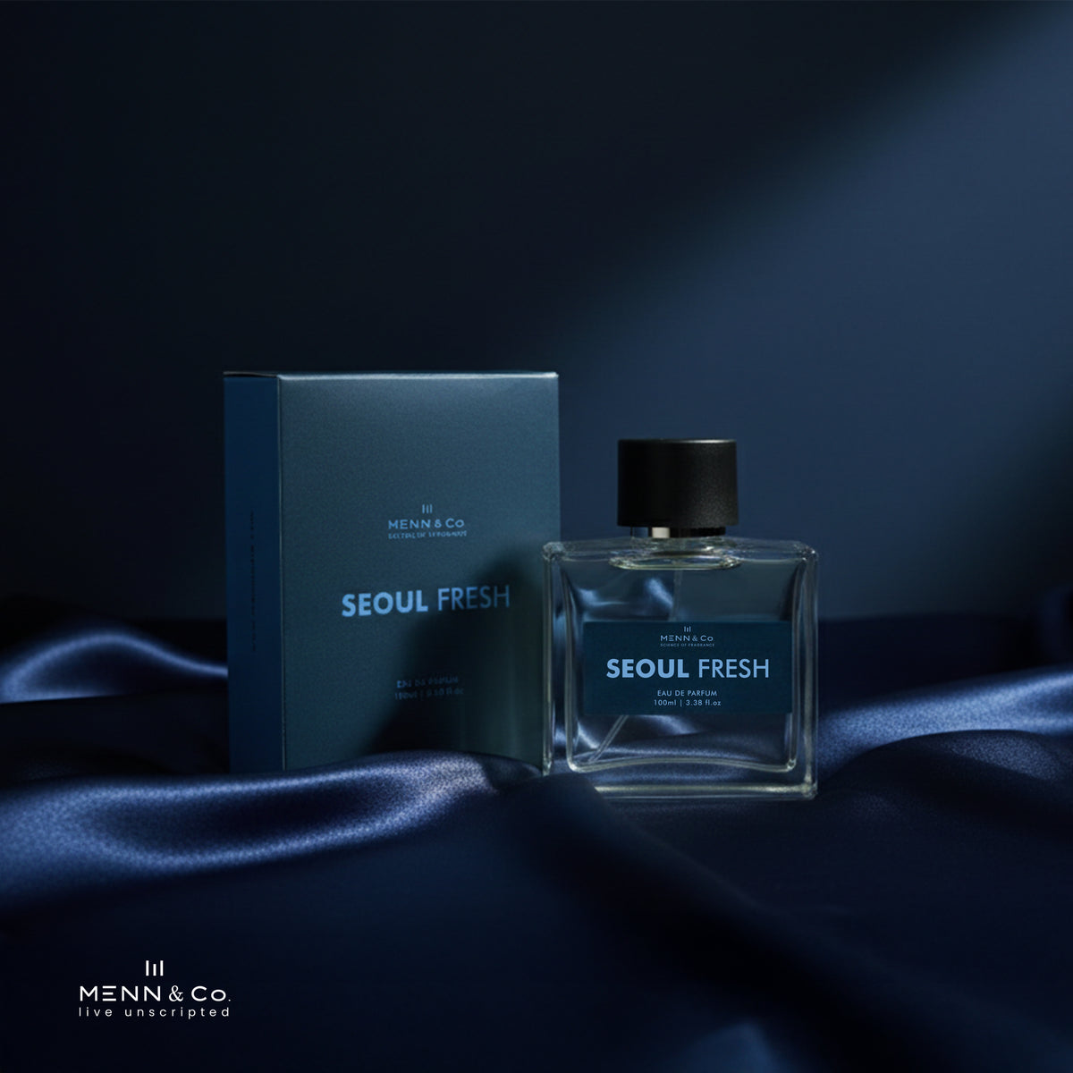 Menn & Co Seoul Fresh perfume bottle and packaging on a dark fabric background