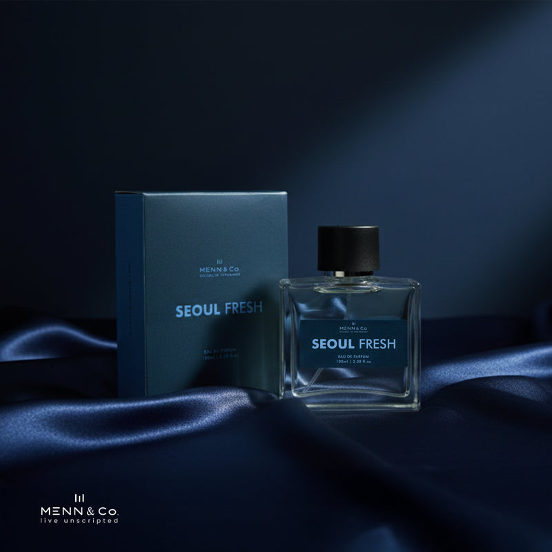 Menn & Co Seoul Fresh perfume bottle and packaging on a dark fabric background