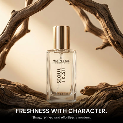 Perfume bottle labeled 'Seoul Fresh' by Menn & Co. on a wooden background with text 'Freshness with Character'.