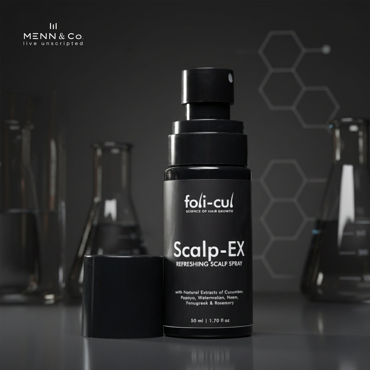 Foli-Cul Scalp-EX refreshing scalp spray bottle on a dark background with Menn & Co branding.