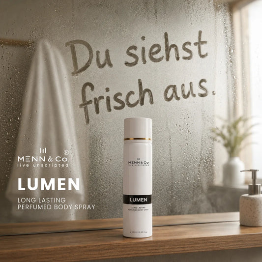 MENN & CO LUMEN body spray on a bathroom counter with a mirror in the background