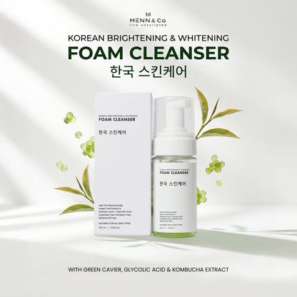 Menn & Co Korean Brightening & Whitening Foam Cleanser shown with its white box and pump bottle on a clean white background with soft leaf graphics and text.